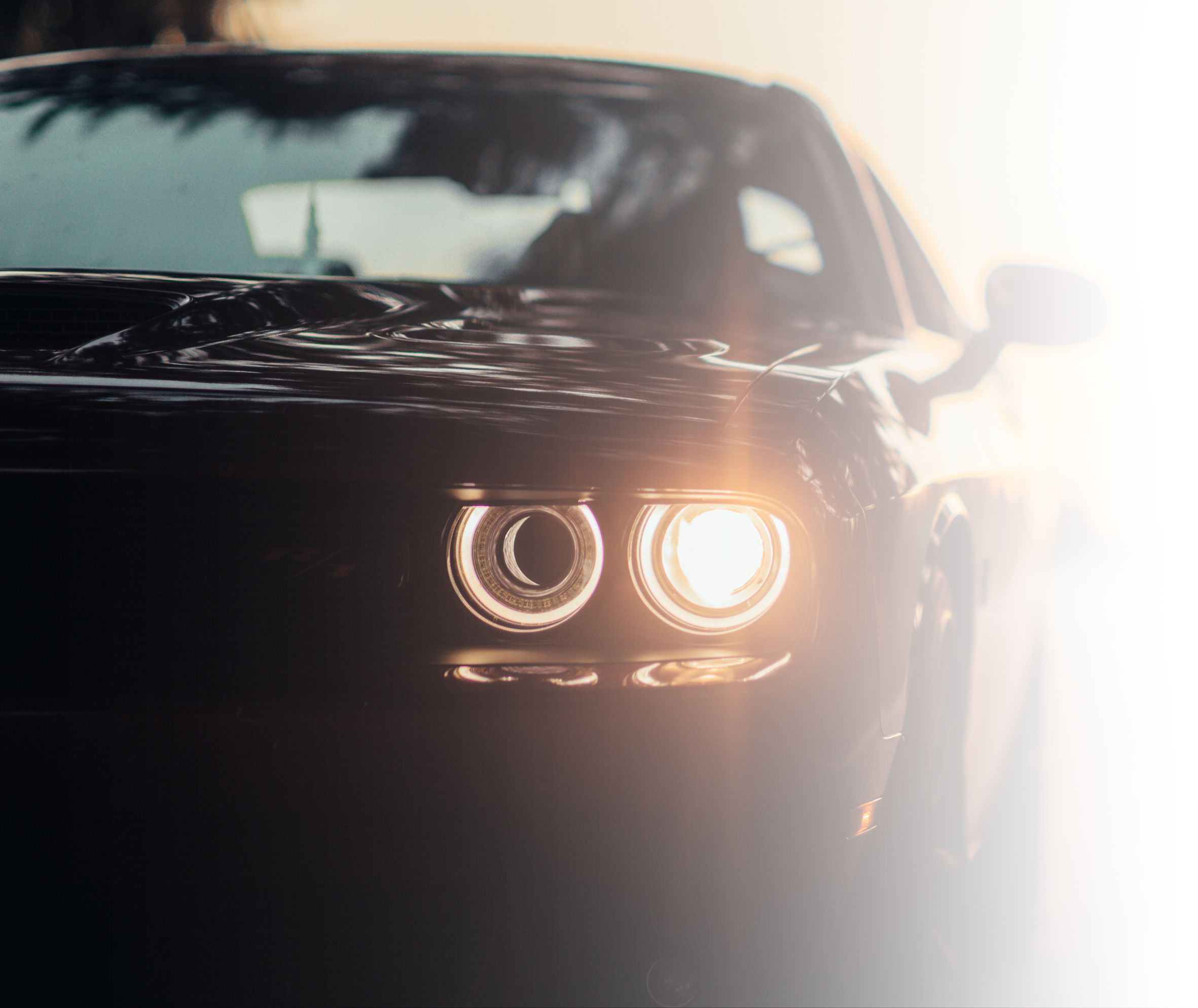 Detailed Dodge Hellcat with a high-gloss finish, showcasing expert exterior detailing in the RGV.